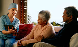 Elderly Couple talking with a doctor
