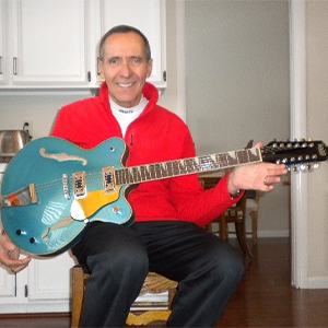 Bob Wassom with his 12 string guitar