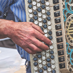 man playing an accordian