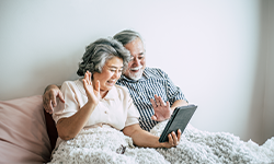 Woman and man using a tablet